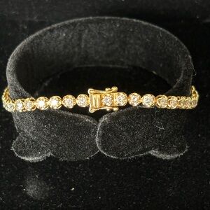 marked 3.00 CTW Tennis bracelet 18K yellow gold 7”